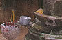 ANGKOR. Preah Khan - incenso e doni al Buddha all'interno della torre del santuario centrale 