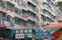 KOWLOON. La brulicante vita di strada tra gli alti condomini di Mong Kok