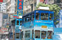 WAN CHAI. I colorati tram a due piani su rotaie di Hong Kong