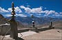 LADAKH - HIMALAYA. Dai tetti del Likir Gompa, oltre gli elementi simbolici caratteristici dei monasteri buddhisti, splendida vista sul paesaggio circostante